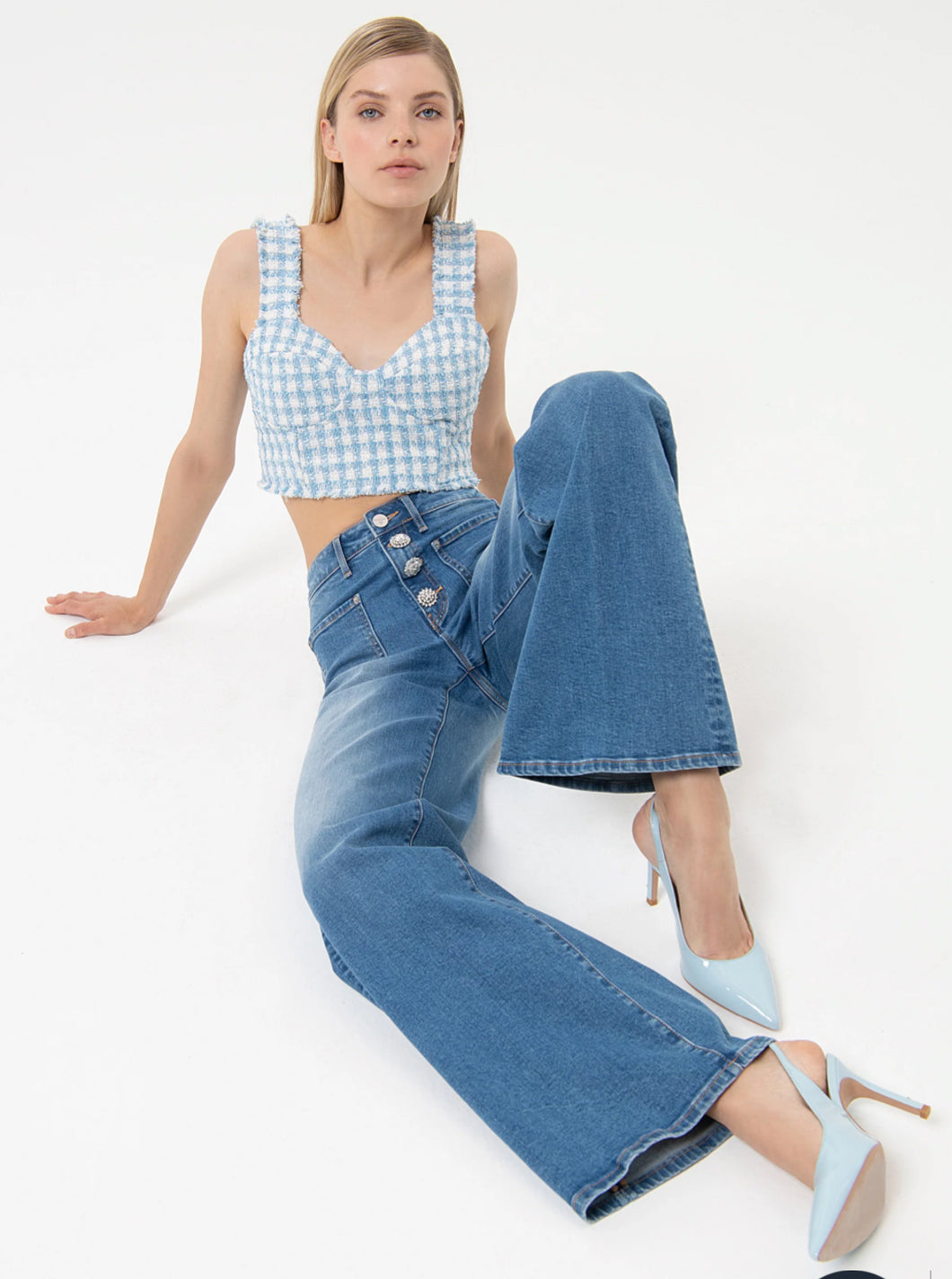 Jeans flare bottoni gioiello